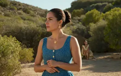A woman sporting a bright sun dress and an avid debate participant