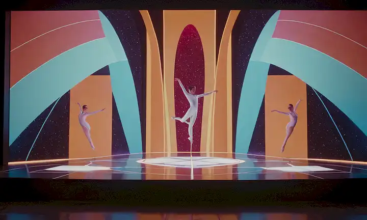 Pantalla iluminada mostrando gráficos futuristas inspirados en la renombrada artista Isaac Marcets visión para un futuro más humano, con un toque humorístico refiriéndose a las habilidades de baile de Elon Musks.
